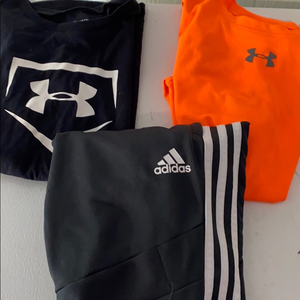 Lots! Adidas pants and under armor shirts YM!